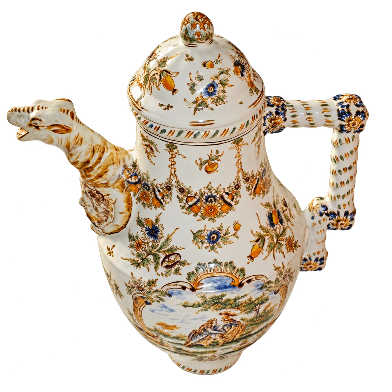 Verseuse ancienne en faïence blanche décorée de fleurs colorées et d'un paysage, avec un bec en forme de tête d'animal et une anse torsadée.